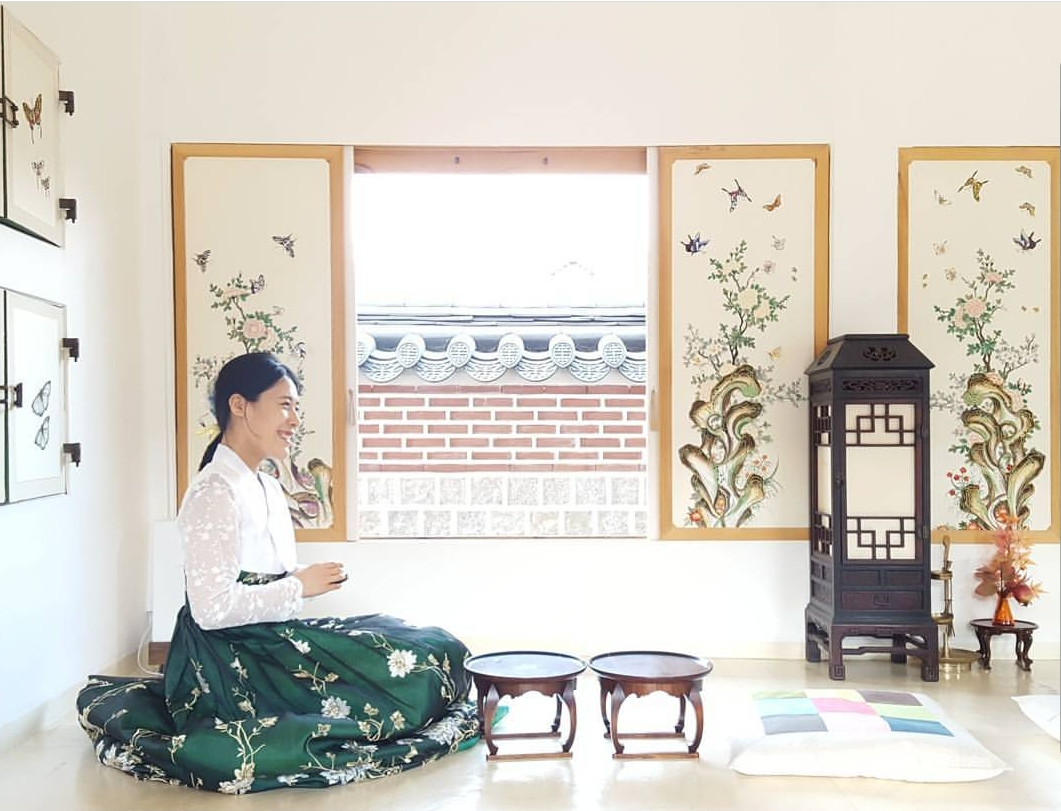 Experience Korea's rich heritage while dressed in a stunning Hanbok surrounded by traditional decor. Perfect for creating memorable moments and immersing yourself in cultural exploration.